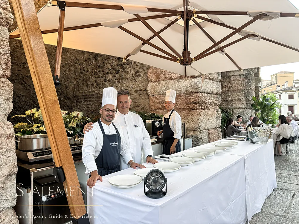 Equipo de cocina preparando el servicio de Star Roof Experience junto a la Arena di Verona